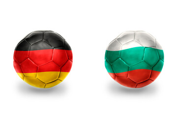 Obraz premium football balls with national flags of germany and bulgaria ,soccer teams. on the white background.