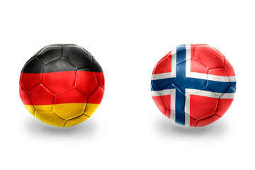 Naklejka premium football balls with national flags of germany and norway ,soccer teams. on the white background.