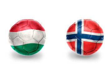 Fototapeta premium football balls with national flags of norway and hungary ,soccer teams. on the white background.
