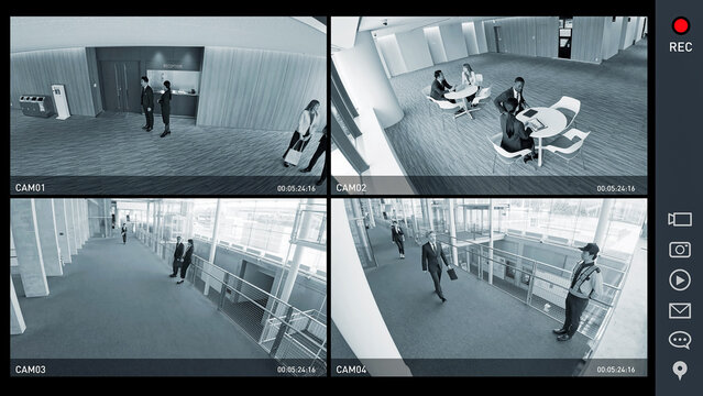 防犯カメラの四分割モニター画面インターフェース　監視カメラ映像