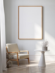 Blank picture frame mockup on white wall. White living room design. View of modern Scandinavian style interior with chair. Home staging and minimalism concept