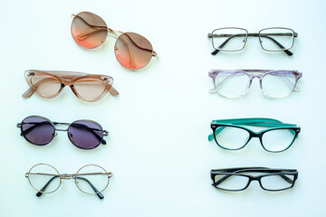 Eyeglasses top view. Comparing lenses in optics store