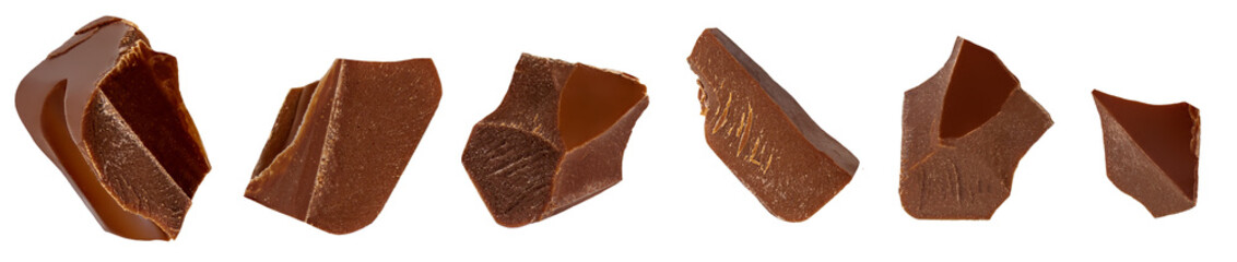 Broken chocolate bar pieces isolated on white background. Dark Chocolate chunks Top view. Flat lay. Pattern. Collection.
