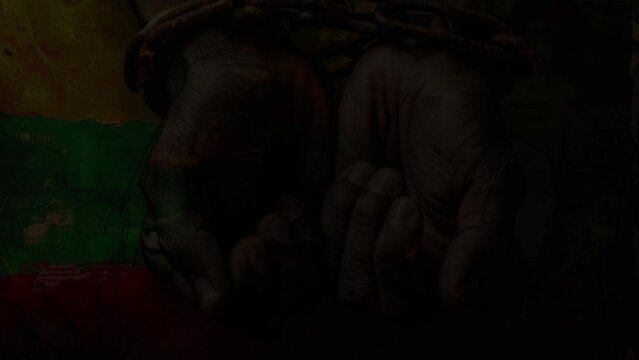 Two hands chained to commemorate Juneteenth Freedom Day, symbolizing the struggle and celebration of emancipation