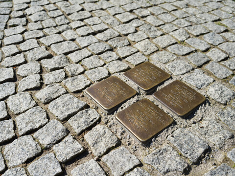 Berlin, Germany, April 27th 2024, Stolpersteine Stumbling Stones in the pavement remembering Holocaust victims