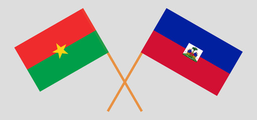 Crossed flags of Burkina Faso and Haiti. Official colors. Correct proportion