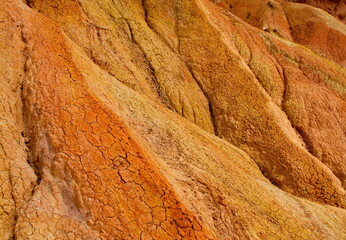 Northern Kyrgyzstan. The unusual texture of red-yellow clay rocks in the famous Skazka Canyon, off the coast of Lake Issyk-Kul.