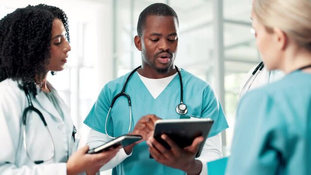Tablet, medical and group in discussion for meeting, brainstorming ideas and nurse training. Teamwork, doctors and people planning on technology for healthcare project or collaboration in hospital