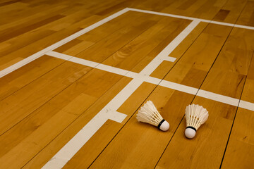 Close-up of the shuttlecocks in the badminton court, sports centre. Sports and recreation concept.