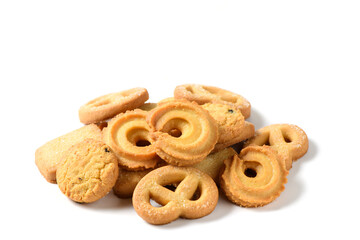 Set of danish butter cookies macro cutout. Five whole pretzel, round and rectangular shortbread biscuits with sugar on white background