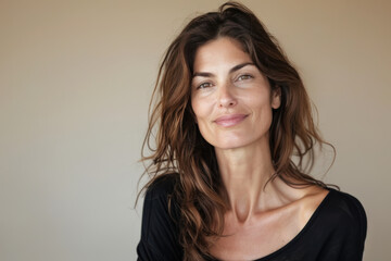 Fototapeta premium A close up portrait of a woman with a subtle smile