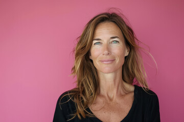 Fototapeta premium A close up portrait of a woman with a subtle smile