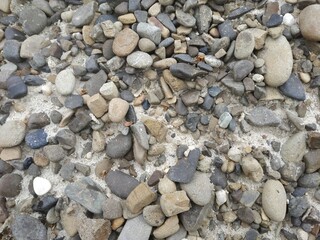 gray natural stone texture background. river stone