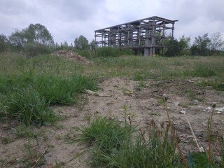 abandoned area industrial zone with old destroyed houses. stalker