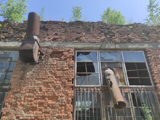 abandoned area industrial zone with old destroyed houses. stalker