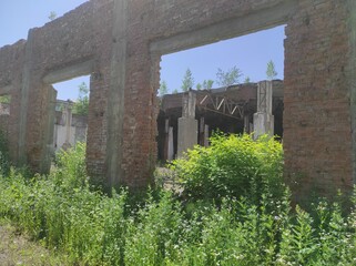 abandoned area industrial zone with old destroyed houses. stalker