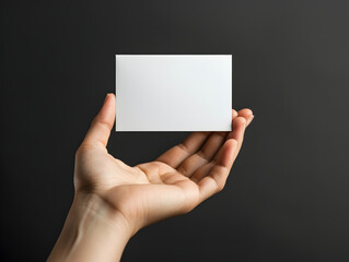 Hand-holding blank business card mockup