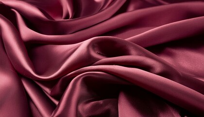 Obraz premium Beautiful background luxury cloth with drapery and wavy folds of burgundy red color creased smooth silk satin material texture. Abstract monochrome luxurious fabric background