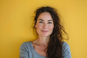 Fototapeta premium A close up portrait of a woman with a subtle smile