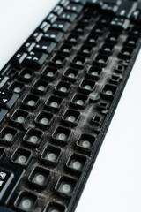 Close-Up of Old Dusty Keyboard with Missing Keys