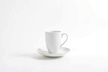 Fototapeta premium White coffee cup and saucer on white background