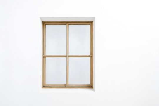 Fototapeta White Wall with Wooden Window