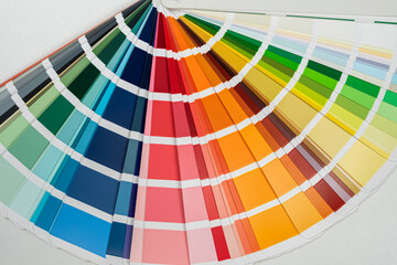 paper catalog of rainbow color isolated on grey