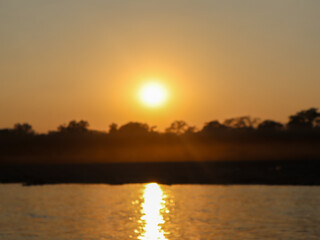 sunset over the river and ocean