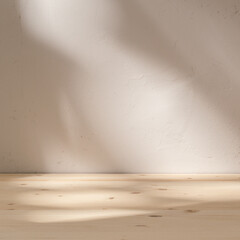 Empty table on stucco background with abstract sun light reflections on the wall.	