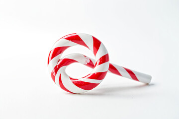 Red and White Candy Cane Isolated on White Background