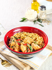 Indonesian chicken soup with noodles, turmeric and ginger (Soto Ayam). Indonesian beef noodles soup (Mie kocok). Seafood Fried Noodles (Mie Goreng - Malay style stir-fried noodles with spicy seafood.
