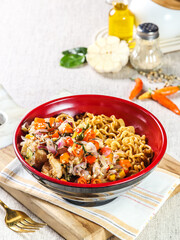 Indonesian chicken soup with noodles, turmeric and ginger (Soto Ayam). Indonesian beef noodles soup (Mie kocok). Seafood Fried Noodles (Mie Goreng - Malay style stir-fried noodles with spicy seafood.
