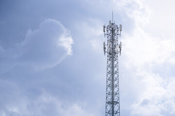 Signal tower or Mobile phone tower .Global connection and internet network concept.on blue sky.