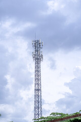 Signal tower or Mobile phone tower .Global connection and internet network concept.on blue sky.