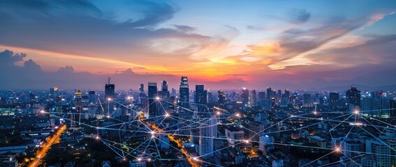 A cityscape at sunset illuminated with a digital network overlay, showcasing urban connectivity and technological advancements in a vibrant metropolis.