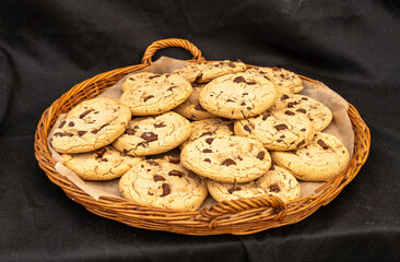 Homemade cookies with chocolate chunks on a tray. Perfect for snacks or dessert, these delicious treats