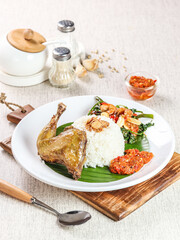 Typical Indonesian chicken rice with lots of spices