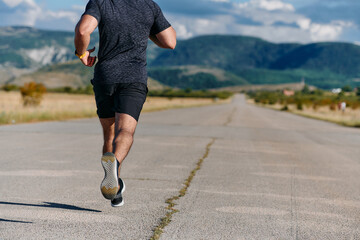 Athletic Man Jogging in the Sun, Preparing His Body for Life's Extreme Challenges