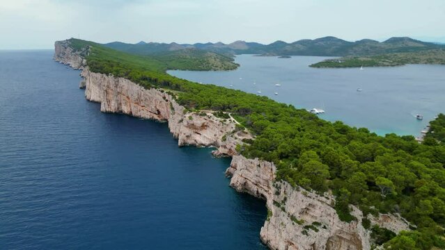 The nature park Tela&scaron;ćica(Telascica) on the island of Dugi Otok, Croatia, is home to some of the most spectacular seascapes, featuring dramatic cliffs towering above the azure sea captured by drone