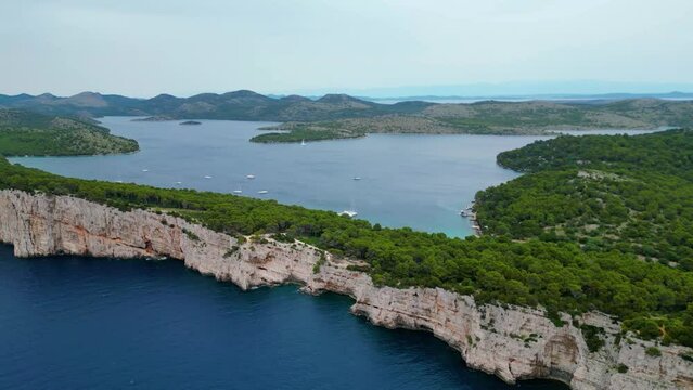 The nature park Tela&scaron;ćica(Telascica) on the island of Dugi Otok, Croatia, is home to some of the most spectacular seascapes, featuring dramatic cliffs towering above the azure sea captured by drone