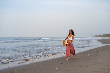 Woman Running Happily on the Beach