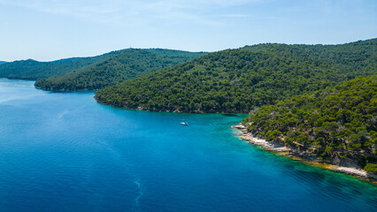 Božava (Bozava) is a charming village located on Dugi Otok, Croatia, perfect for a serene summer getaway captured by drone