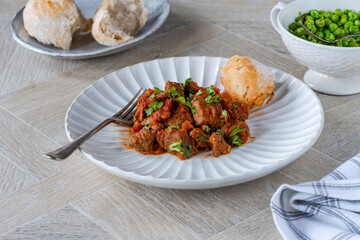 Braised beef stew in red wine and tomato sauce