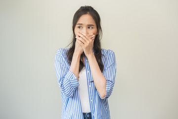 Portrait of pretty brunette hair, disgust smell bad breath strong asian young woman shocked...