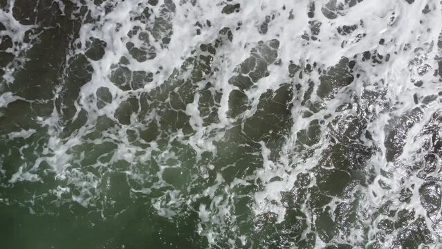 Waves crashing on the shore.