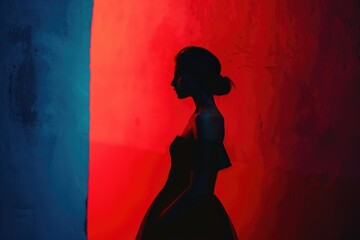 A woman standing in front of a vibrant red and blue wall with a bold design