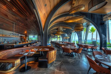 A modern restaurant with tables and chairs overlooking the ocean, suitable for romantic dinners or special occasions