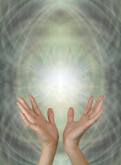 Tuning into high vibrational star light - female hands reaching up into intricate energy formation starlight a powerful natural healing source

