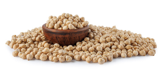 A clay bowl full of chickpeas stands in a pile of scattered chickpeas. Heap of chickpeas isolated on white background.
