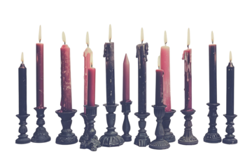 Pair of Shabbat candles in elegant candlesticks, lit.